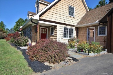 This unique Cape Cod is located in the Gottscheer Country Club on Osiris Country Club in New York - for sale on GolfHomes.com, golf home, golf lot