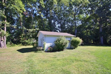 This unique Cape Cod is located in the Gottscheer Country Club on Osiris Country Club in New York - for sale on GolfHomes.com, golf home, golf lot