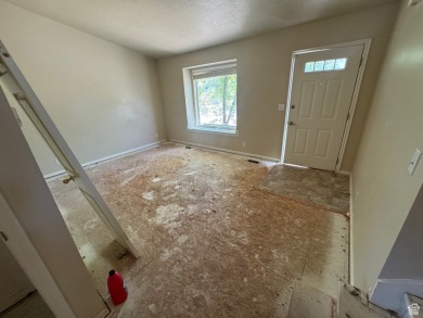 Fantastic value in Layton! This multi-level home offers 3 on Sun Hills Golf Course in Utah - for sale on GolfHomes.com, golf home, golf lot