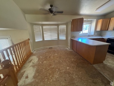 Fantastic value in Layton! This multi-level home offers 3 on Sun Hills Golf Course in Utah - for sale on GolfHomes.com, golf home, golf lot