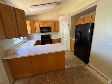 Fantastic value in Layton! This multi-level home offers 3 on Sun Hills Golf Course in Utah - for sale on GolfHomes.com, golf home, golf lot