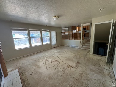 Fantastic value in Layton! This multi-level home offers 3 on Sun Hills Golf Course in Utah - for sale on GolfHomes.com, golf home, golf lot