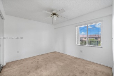 Resort-Style Living in Century Village! Enjoy stunning lake on Flamingo Lakes Country Club in Florida - for sale on GolfHomes.com, golf home, golf lot