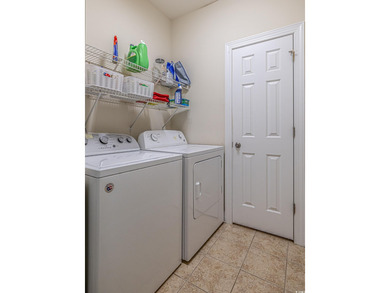 Tucked inside a private gated community in the heart of Murrells on Indigo Creek Golf Club in South Carolina - for sale on GolfHomes.com, golf home, golf lot