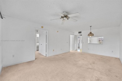 Resort-Style Living in Century Village! Enjoy stunning lake on Flamingo Lakes Country Club in Florida - for sale on GolfHomes.com, golf home, golf lot