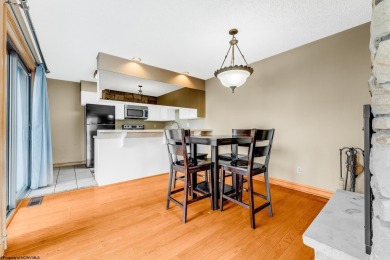 Welcome to this 2 bed, 3.5 bath contemporary end-unit townhome on Lakeview Golf Resort and Spa - Lakeview in West Virginia - for sale on GolfHomes.com, golf home, golf lot