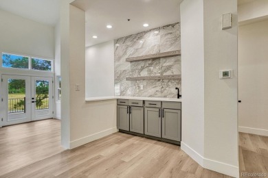 Welcome to this stunning, fully remodeled two-story residence on Country Club at Castle Pines in Colorado - for sale on GolfHomes.com, golf home, golf lot