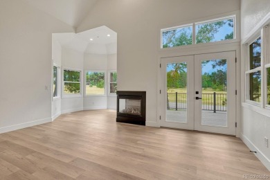 Welcome to this stunning, fully remodeled two-story residence on Country Club at Castle Pines in Colorado - for sale on GolfHomes.com, golf home, golf lot
