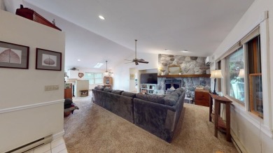 This ranch-style home offers an impressive array of features on The Pines Golf Course at Lake Isabella in Michigan - for sale on GolfHomes.com, golf home, golf lot