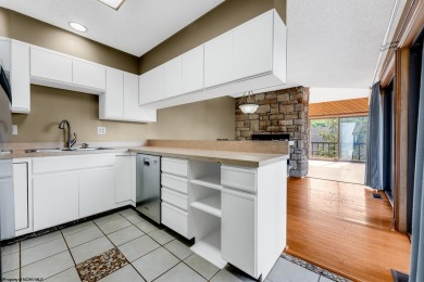 Welcome to this 2 bed, 3.5 bath contemporary end-unit townhome on Lakeview Golf Resort and Spa - Lakeview in West Virginia - for sale on GolfHomes.com, golf home, golf lot