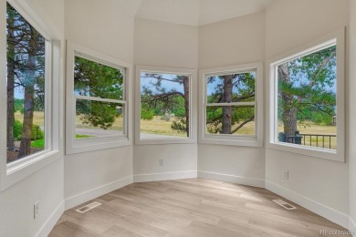 Welcome to this stunning, fully remodeled two-story residence on Country Club at Castle Pines in Colorado - for sale on GolfHomes.com, golf home, golf lot