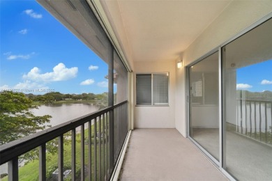 Resort-Style Living in Century Village! Enjoy stunning lake on Flamingo Lakes Country Club in Florida - for sale on GolfHomes.com, golf home, golf lot
