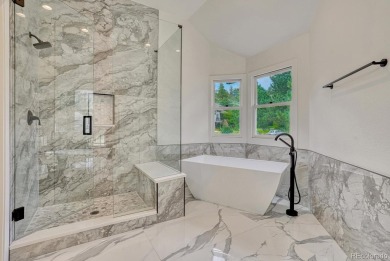 Welcome to this stunning, fully remodeled two-story residence on Country Club at Castle Pines in Colorado - for sale on GolfHomes.com, golf home, golf lot