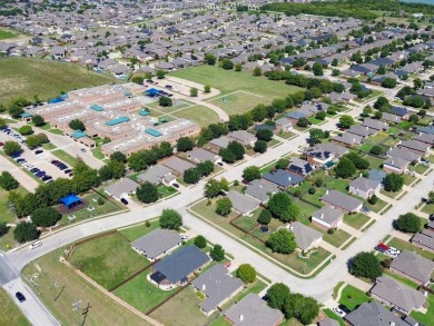 Discover this beautifully updated 3-bedroom, 2-bathroom home on Mansfield National Golf Club in Texas - for sale on GolfHomes.com, golf home, golf lot