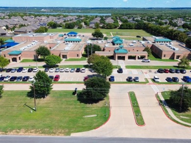 Discover this beautifully updated 3-bedroom, 2-bathroom home on Mansfield National Golf Club in Texas - for sale on GolfHomes.com, golf home, golf lot