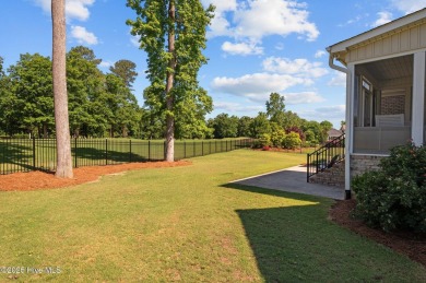 Well appointed with a view of the 11th tee box is this 5 bedroom on Ironwood Golf and Country Club in North Carolina - for sale on GolfHomes.com, golf home, golf lot
