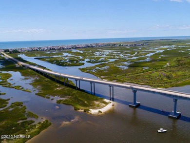 Large, wooded lot on Oyster Bay #11 Hole in Sea Trail Plantation on Sea Trail Golf Resort in North Carolina - for sale on GolfHomes.com, golf home, golf lot