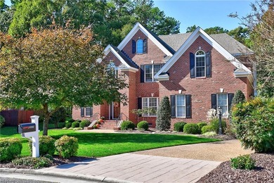 Discover effortless elegance in this custom brick home nestled on Riverfront Golf Club in Virginia - for sale on GolfHomes.com, golf home, golf lot