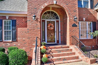 Discover effortless elegance in this custom brick home nestled on Riverfront Golf Club in Virginia - for sale on GolfHomes.com, golf home, golf lot