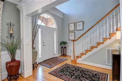 Discover effortless elegance in this custom brick home nestled on Riverfront Golf Club in Virginia - for sale on GolfHomes.com, golf home, golf lot