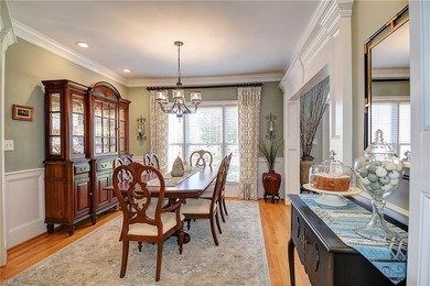 Discover effortless elegance in this custom brick home nestled on Riverfront Golf Club in Virginia - for sale on GolfHomes.com, golf home, golf lot