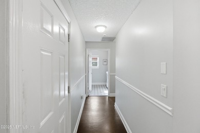 Welcome to a home that was built with care, lived in with pride on Hidden Hills Country Club in Florida - for sale on GolfHomes.com, golf home, golf lot