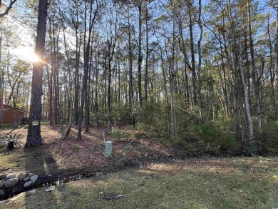 Build your forever home on this large, 1.9 acre lot located on a on Carolina Shores Golf Course in North Carolina - for sale on GolfHomes.com, golf home, golf lot