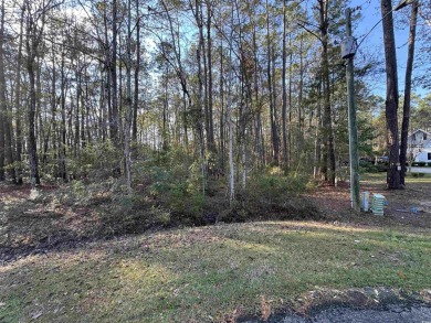 Build your forever home on this large, 1.9 acre lot located on a on Carolina Shores Golf Course in North Carolina - for sale on GolfHomes.com, golf home, golf lot