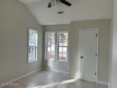 Charming cottage with 11 foot ceilings, bright and airy with a on Pearl Golf Links in North Carolina - for sale on GolfHomes.com, golf home, golf lot