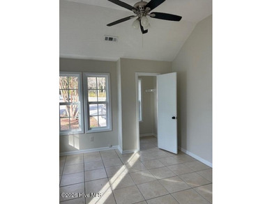 Charming cottage with 11 foot ceilings, bright and airy with a on Pearl Golf Links in North Carolina - for sale on GolfHomes.com, golf home, golf lot