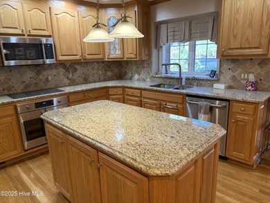 Talk about the ''WOW'' factor! The features on this gorgeous on Sound Golf Links at Albemarle Plantation in North Carolina - for sale on GolfHomes.com, golf home, golf lot