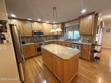 Talk about the ''WOW'' factor! The features on this gorgeous on Sound Golf Links at Albemarle Plantation in North Carolina - for sale on GolfHomes.com, golf home, golf lot