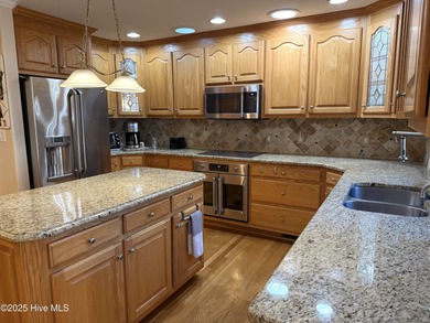 Talk about the ''WOW'' factor! The features on this gorgeous on Sound Golf Links at Albemarle Plantation in North Carolina - for sale on GolfHomes.com, golf home, golf lot