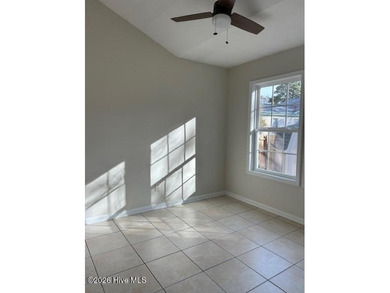 Charming cottage with 11 foot ceilings, bright and airy with a on Pearl Golf Links in North Carolina - for sale on GolfHomes.com, golf home, golf lot