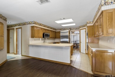 This 4 bedrooms, 3 bathrooms (one is a Jack and Jill) home on Mount Pleasant Country Club in Texas - for sale on GolfHomes.com, golf home, golf lot