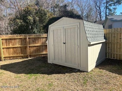 Charming cottage with 11 foot ceilings, bright and airy with a on Pearl Golf Links in North Carolina - for sale on GolfHomes.com, golf home, golf lot
