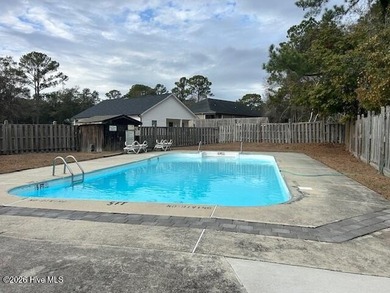 Charming cottage with 11 foot ceilings, bright and airy with a on Pearl Golf Links in North Carolina - for sale on GolfHomes.com, golf home, golf lot