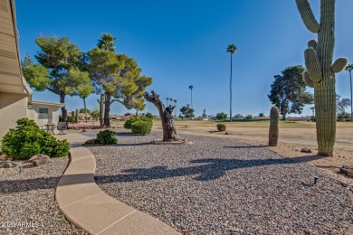 E X Q U I S I T E  golf course residence. Inside, you'll find a on Sun City Lakes West and East in Arizona - for sale on GolfHomes.com, golf home, golf lot