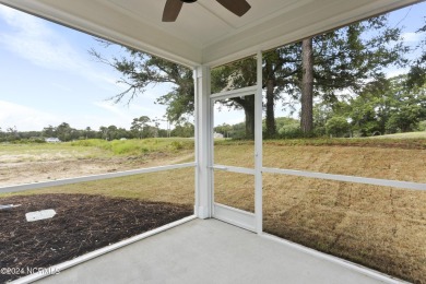 Welcome to beach life in this adorable, easy to live in home on Brick Landing Plantation Yacht and Golf Club in North Carolina - for sale on GolfHomes.com, golf home, golf lot