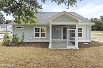 Welcome to beach life in this adorable, easy to live in home on Brick Landing Plantation Yacht and Golf Club in North Carolina - for sale on GolfHomes.com, golf home, golf lot