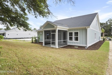 Welcome to beach life in this adorable, easy to live in home on Brick Landing Plantation Yacht and Golf Club in North Carolina - for sale on GolfHomes.com, golf home, golf lot