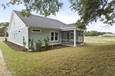 Welcome to beach life in this adorable, easy to live in home on Brick Landing Plantation Yacht and Golf Club in North Carolina - for sale on GolfHomes.com, golf home, golf lot