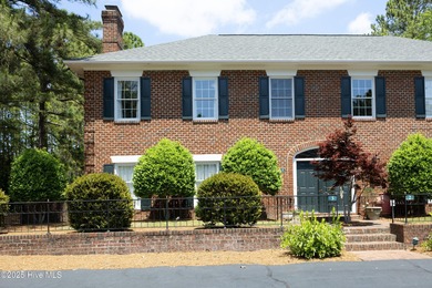 Located in one of the area's most coveted townhome neighborhoods on Knollwood Fairways and Driving  in North Carolina - for sale on GolfHomes.com, golf home, golf lot