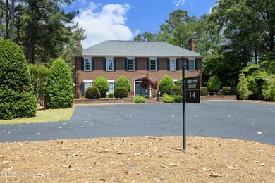 Located in one of the area's most coveted townhome neighborhoods on Knollwood Fairways and Driving  in North Carolina - for sale on GolfHomes.com, golf home, golf lot