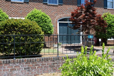 Located in one of the area's most coveted townhome neighborhoods on Knollwood Fairways and Driving  in North Carolina - for sale on GolfHomes.com, golf home, golf lot