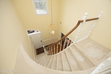 Located in one of the area's most coveted townhome neighborhoods on Knollwood Fairways and Driving  in North Carolina - for sale on GolfHomes.com, golf home, golf lot