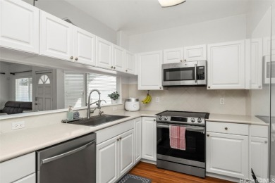Welcome to Spinnaker Townhomes - Unit 5905, a rare single-level on Hoakalei Country Club At Ocean Pointe in Hawaii - for sale on GolfHomes.com, golf home, golf lot