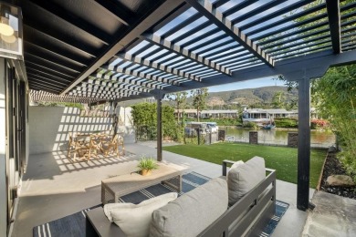 Live lakeside luxury every day in this breathtakingly remodeled on Lake San Marcos Country Club- South Course in California - for sale on GolfHomes.com, golf home, golf lot