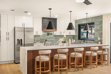 Live lakeside luxury every day in this breathtakingly remodeled on Lake San Marcos Country Club- South Course in California - for sale on GolfHomes.com, golf home, golf lot