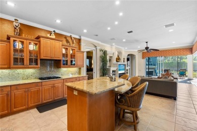 Nestled along the water, this breathtaking estate home on Miromar Lakes Golf Club in Florida - for sale on GolfHomes.com, golf home, golf lot